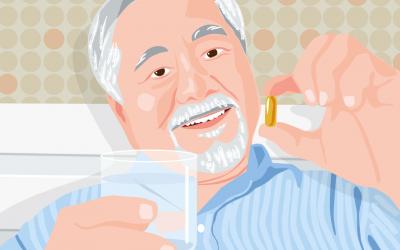 Anciano tomando cápsulas de omega 3 para prevenir las pérdidas de memoria