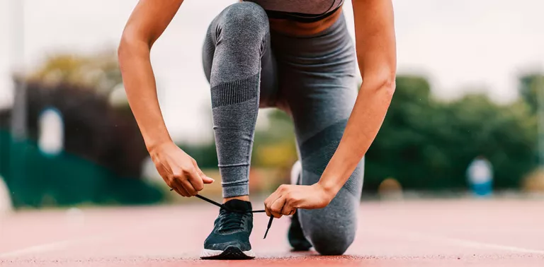 Woman preparing to run