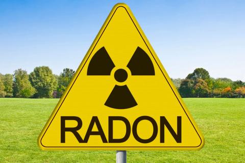 Cartel de advertencia por gas radón