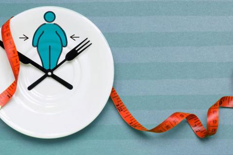 Concepto de horario de comidas y obesidad