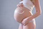 Mujer embarazada con estrías