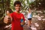 Consejos para la práctica de trail running Pareja de corredores contentos