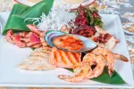Precios orientativos de los principales mariscos Plato con mariscos y pescado a la plancha