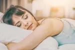 Cuánto más duermes, menos azúcar te pide tu cerebro Mujer durmiendo