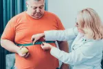 Síndrome metabólico Persona con síndrome metabólico en el médico