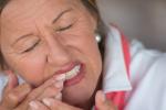 Mujer menopáusica con periodontitis